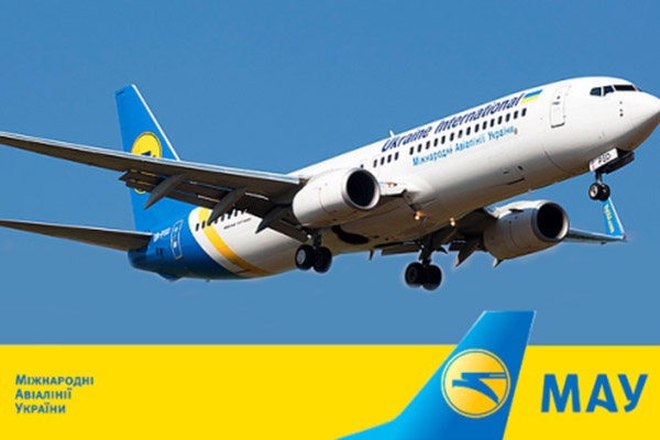 Ukraine International Airlines plane flying in clear sky